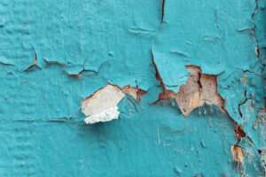 Texture of cracked blue and brown wall background. Creative and moody color of the picture.