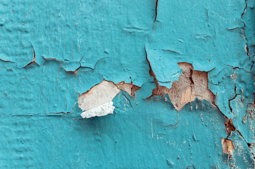 Texture of cracked blue and brown wall background. Creative and moody color of the picture.