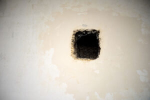 hole in in wall as a background