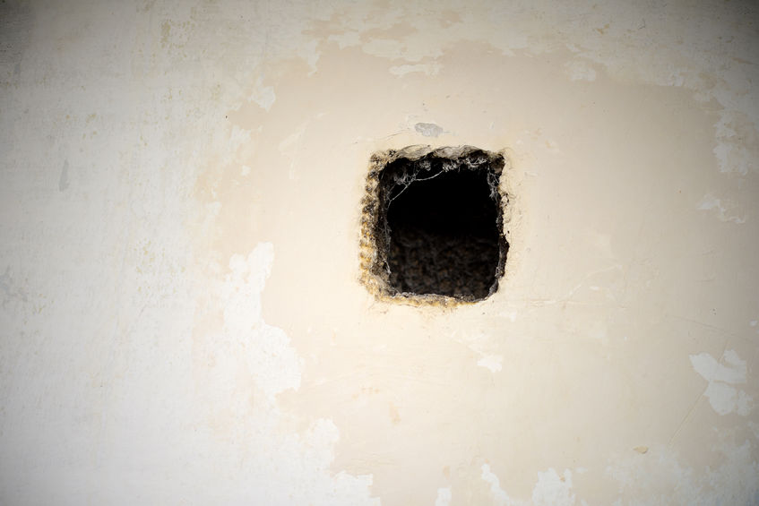 hole in in wall as a background