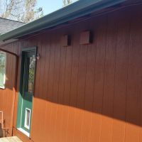 Brown painted wood siding by JP Custom Painting