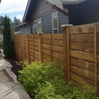 Wooden painted fence in Bend OR